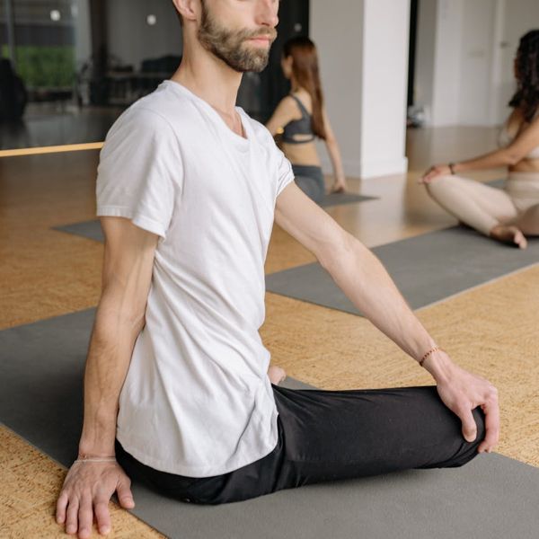 Person in a balanced pose, symbolizing mental and physical harmony.